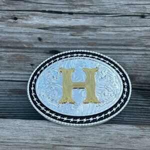 Western Style Matte Black and Silver Oval Shaped Gold Initial H Belt Buckle